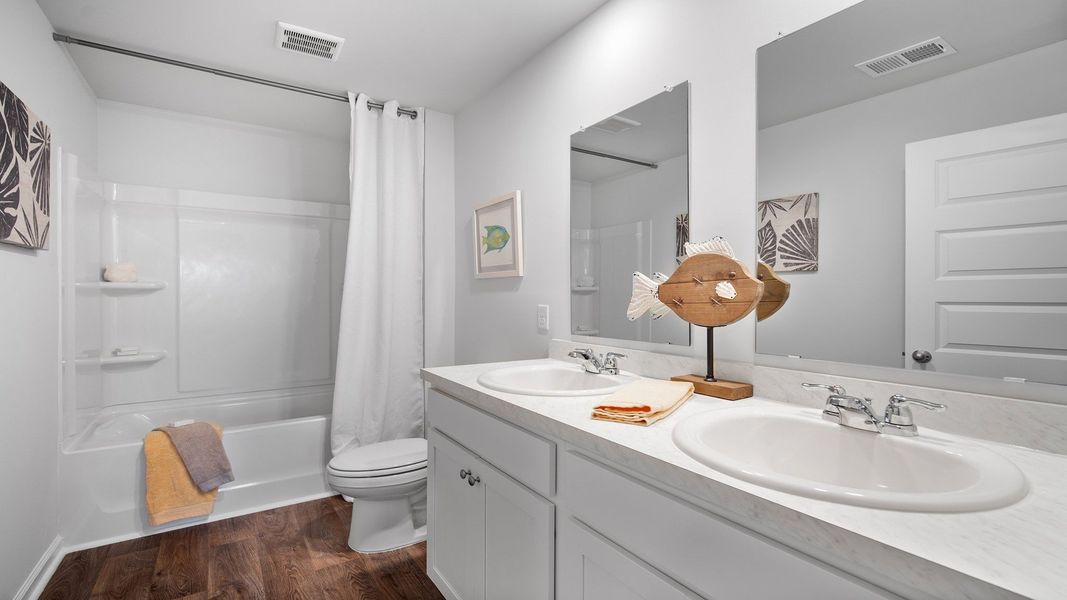 Furnished interior view inside a new home in The Groves at Bees Creek, Ridgeland (Image 31).