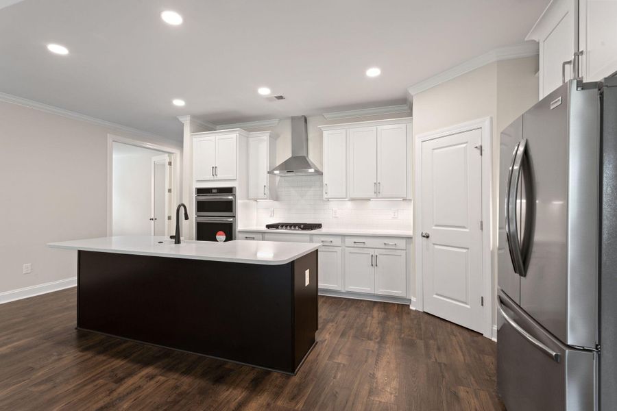 Furnished interior view inside a new home in Tidewater at Lakes of Cane Bay, Summerville (Image 8).