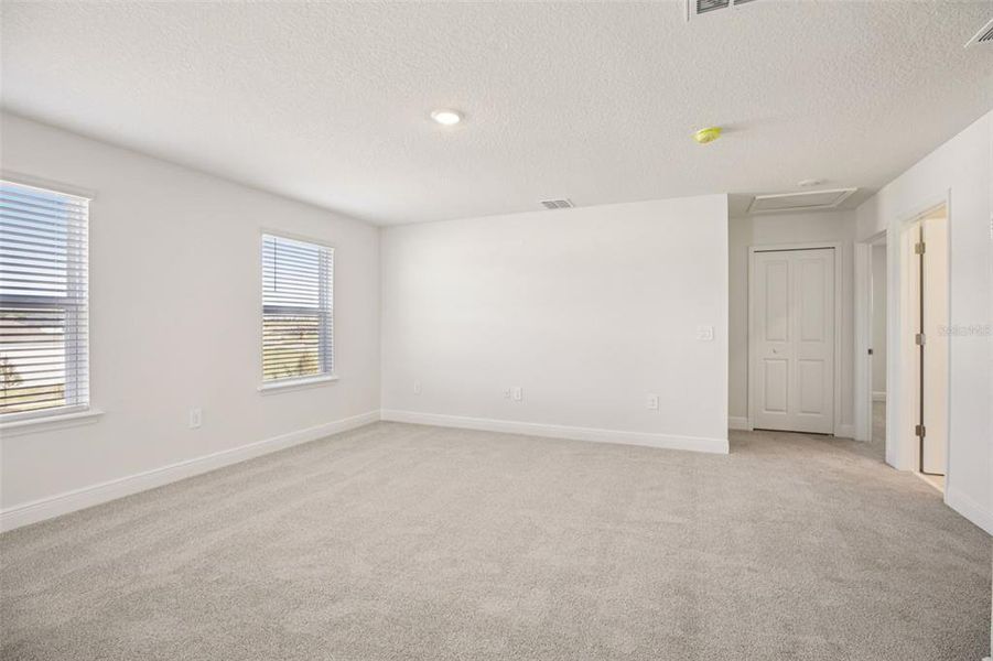 Spacious, unfurnished interior of a new home in The Reserve at Hammock Oaks - Classic Series, Lady Lake (Image 37).