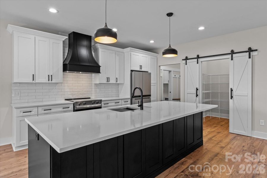 Dream Kitchen, massive island with extra storage and seating, and walk-in pantry