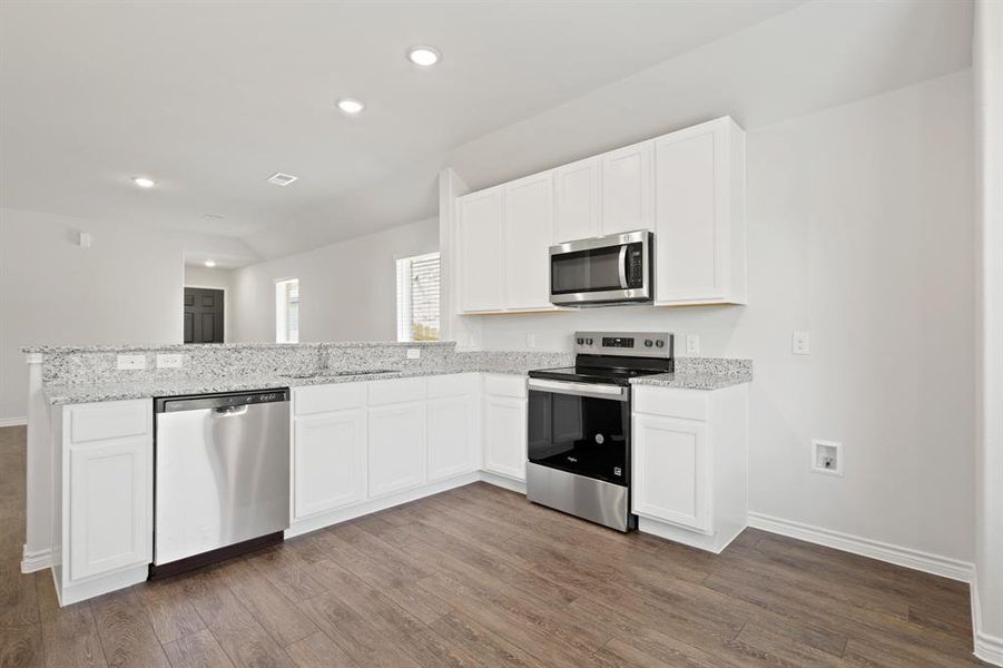 Furnished interior view inside a new home in Christian Meadows, Ennis (Image 6).