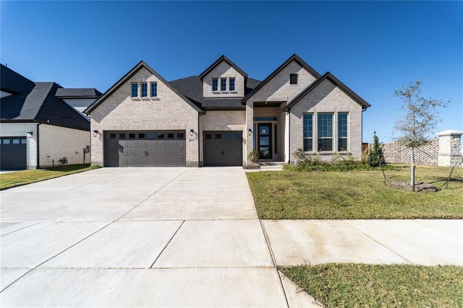 Front exterior of a new home in Green Meadows, Celina, TX, highlighting curb appeal (Image 1). Front exterior of a new home in Green Meadows, Celina, TX, highlighting curb appeal (Image 1).