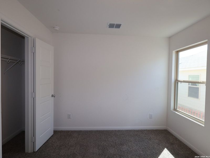 Spacious, unfurnished interior of a new home in Hunters Ranch, San Antonio (Image 31).