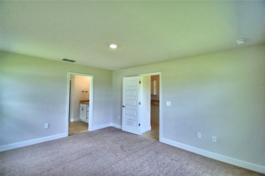 Spacious, unfurnished interior of a new home in Cadence Crossing, Auburndale (Image 34).