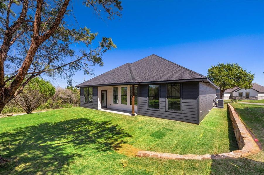 Exterior details and patio area of a home in , Granbury (Image 23). Exterior details and patio area of a home in , Granbury (Image 23).
