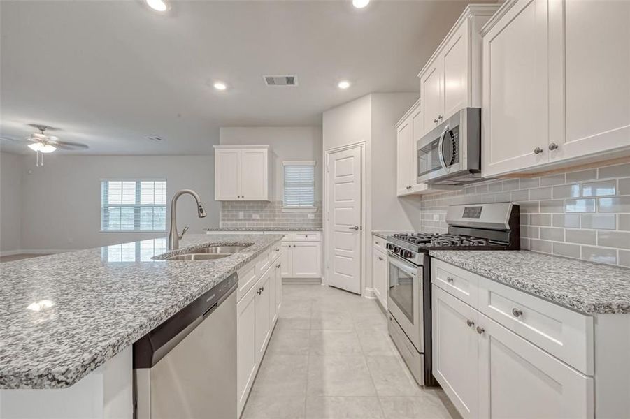 Representative furnished interior of a home built from the Plan 2500 by Adams Homes in The Bluffs at Lafayette, Freeport (Image 7).