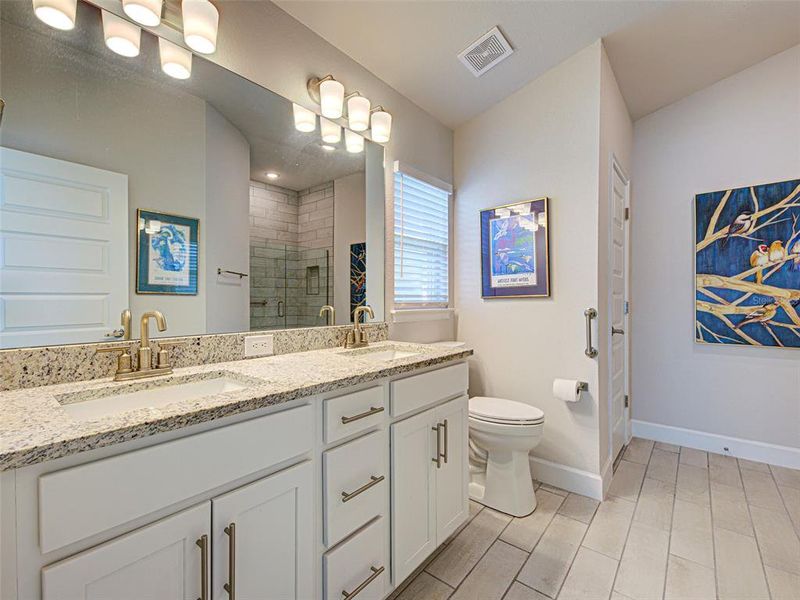 Furnished interior view inside a new home in Watercress Cove, North Port (Image 30).