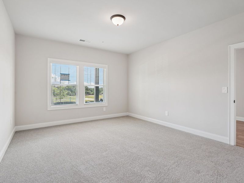 Spacious, unfurnished interior of a new home in Hemingway - Highland Series, Cumming (Image 14).