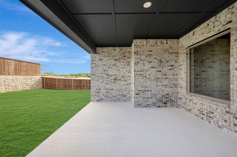 Exterior details and patio area of a home in Monterra - Classics, Fate (Image 3). Exterior details and patio area of a home in Monterra - Classics, Fate (Image 3).