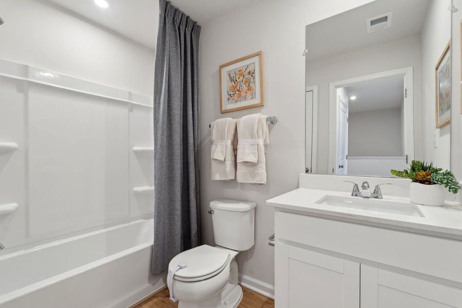 Representative furnished interior of a home built from the The Rutledge by Stanley Martin Homes in Essence at Trinity Townhomes, Columbia (Image 41).