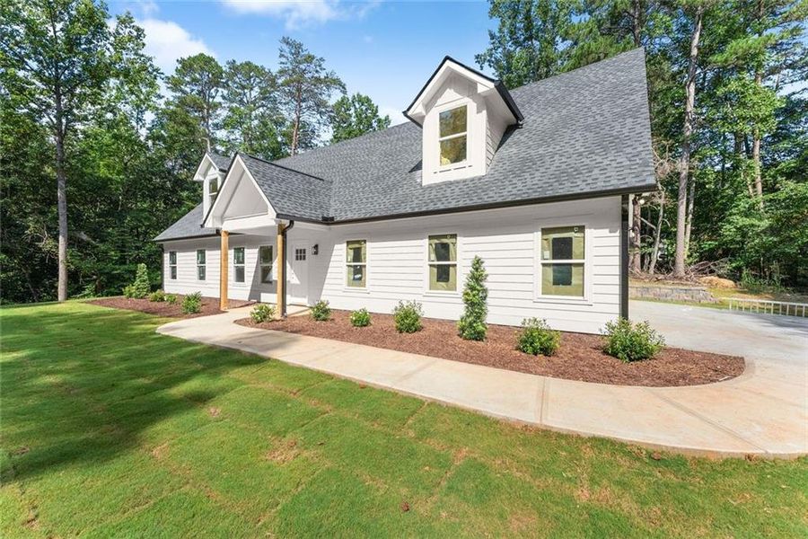 Front exterior of a new home in , Gainesville, GA, highlighting curb appeal (Image 1). Front exterior of a new home in , Gainesville, GA, highlighting curb appeal (Image 1).