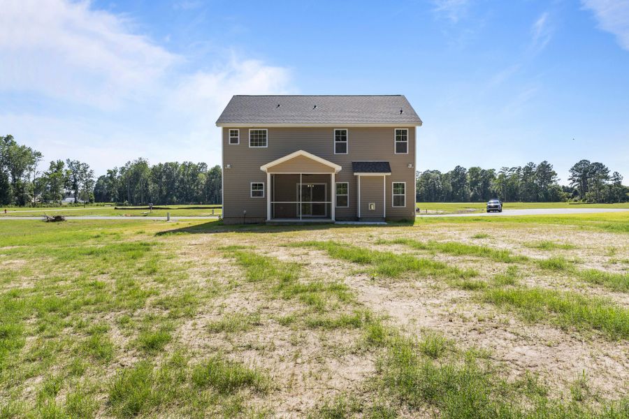 Front exterior of a new home in Laurel Oaks, Greenville, NC, highlighting curb appeal (Image 36). Front exterior of a new home in Laurel Oaks, Greenville, NC, highlighting curb appeal (Image 36).
