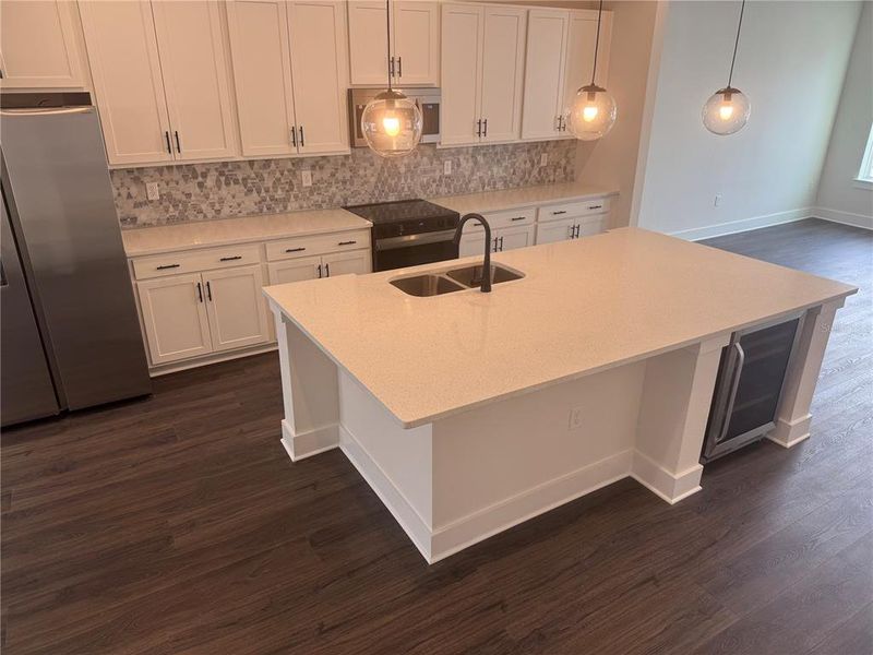 Massive Kitchen Island with Guest Seating.