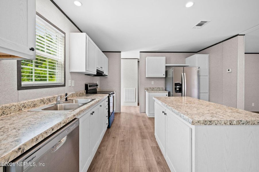 Furnished interior view inside a new home in , Lake City (Image 6).