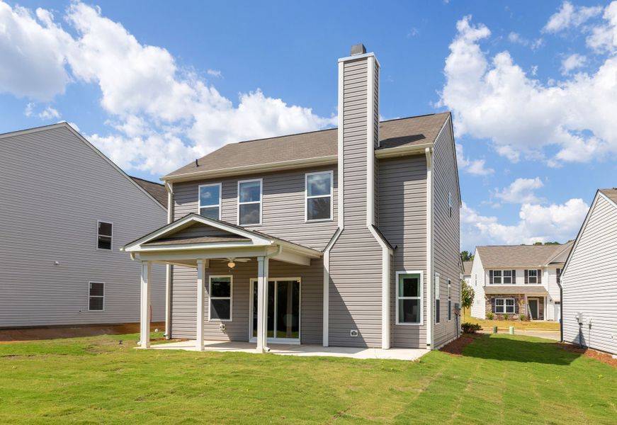 Exterior details and patio area of a home in Tanglewood East, Angier (Image 2). Exterior details and patio area of a home in Tanglewood East, Angier (Image 2).
