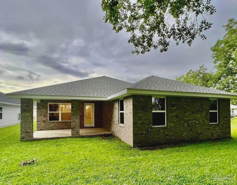 Exterior details and patio area of a home in Emerald Heights, Pensacola (Image 2). Exterior details and patio area of a home in Emerald Heights, Pensacola (Image 2).