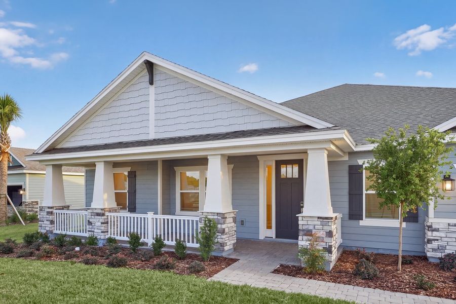 Front exterior of a new home in Headwaters at Lofton Creek, Yulee, FL, highlighting curb appeal (Image 20).