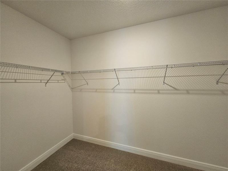 Spacious, unfurnished interior of a new home in The Reserve at Hammock Oaks - Signature Series, Lady Lake (Image 35).