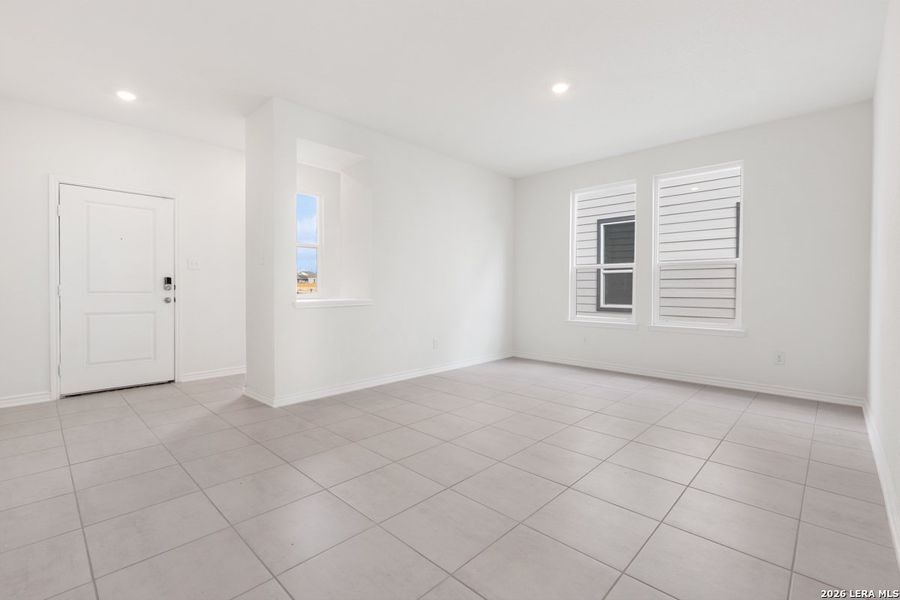 Spacious, unfurnished interior of a new home in Hidden Bluffs at TRP, San Antonio (Image 13).