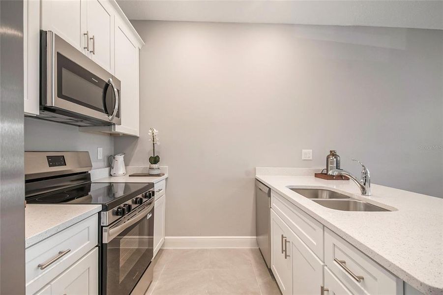 Furnished interior view inside a new home in , Kissimmee (Image 18). Furnished interior view inside a new home in , Kissimmee (Image 18).