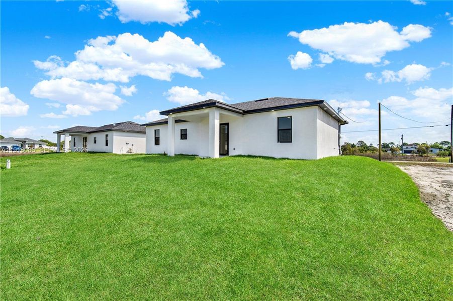 Exterior details and patio area of a home in , Lehigh Acres (Image 3).