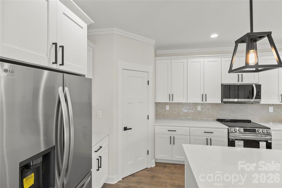 The pendants over the island feauture lights that shine on ceiling for mood lighting. The main bulb lights up and also there is an LED lower ring on bottom of light for more light or to be used at night time.