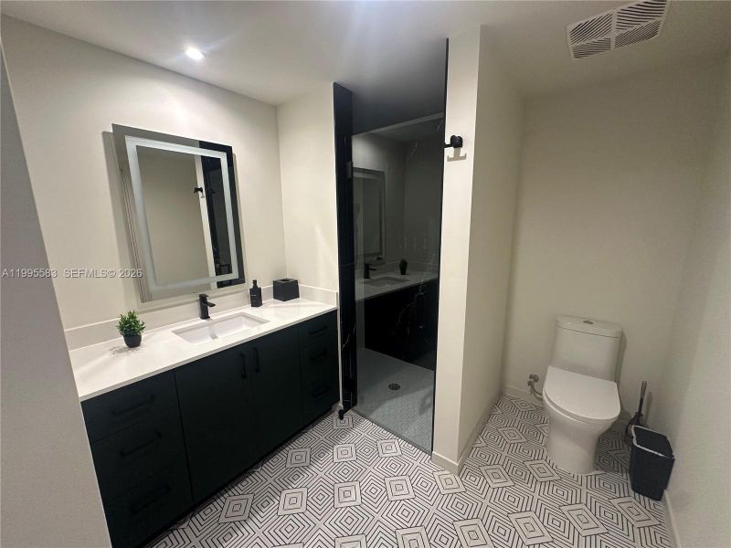 Furnished interior view inside a new home in , Coral Gables (Image 11). Furnished interior view inside a new home in , Coral Gables (Image 11).