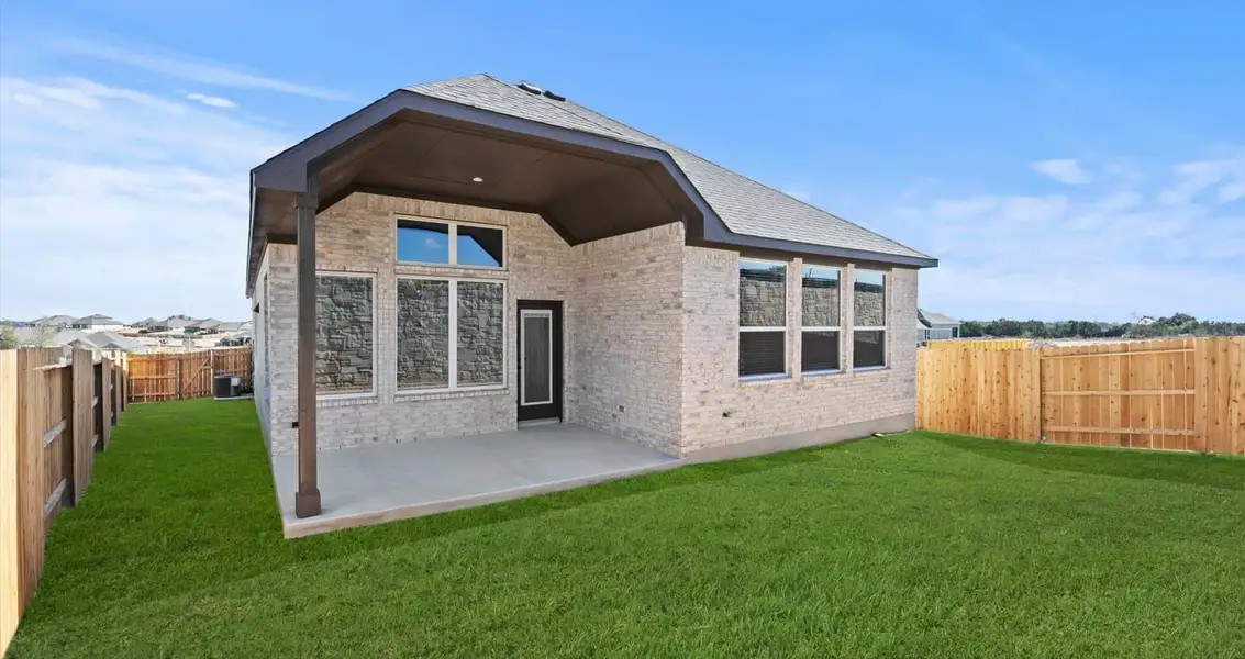 Exterior details and patio area of a home in Meyer Ranch, New Braunfels (Image 3).