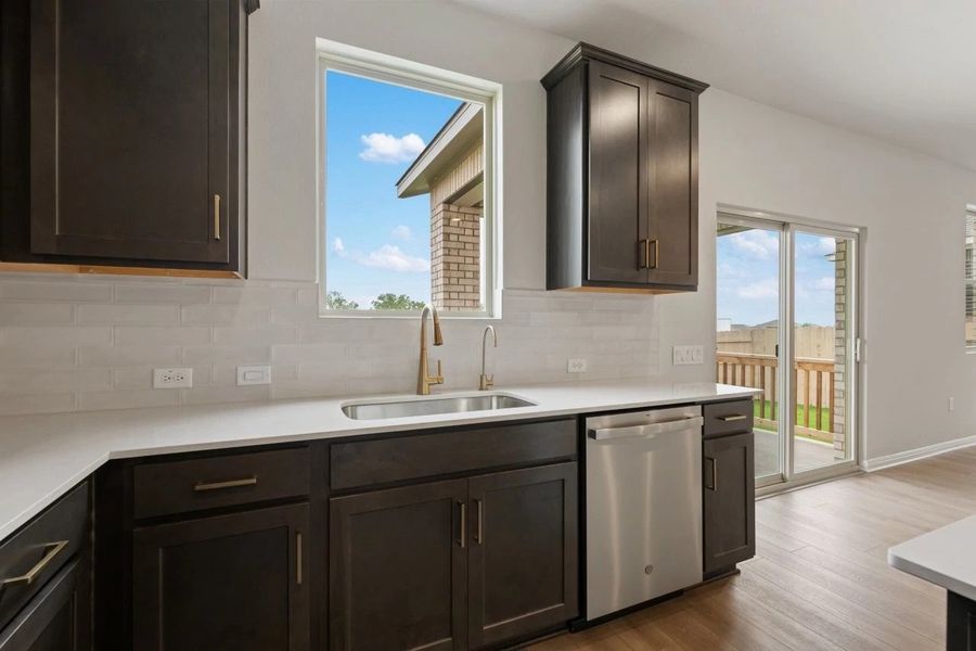 Furnished interior view inside a new home in The Colony, Bastrop (Image 9).