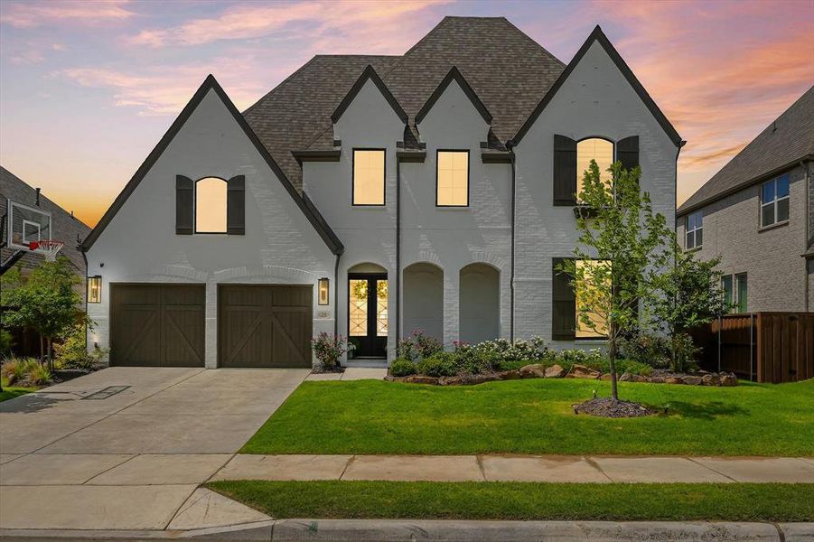 Front exterior of a new home in Star Trail, Prosper, TX, highlighting curb appeal (Image 23).