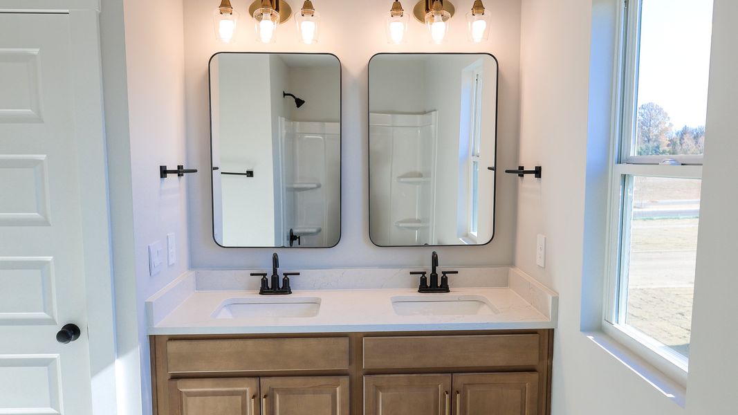 Representative furnished interior of a home built from the STONEBROOK II by D.R. Horton in Harvest Point, Spring Hill (Image 18).