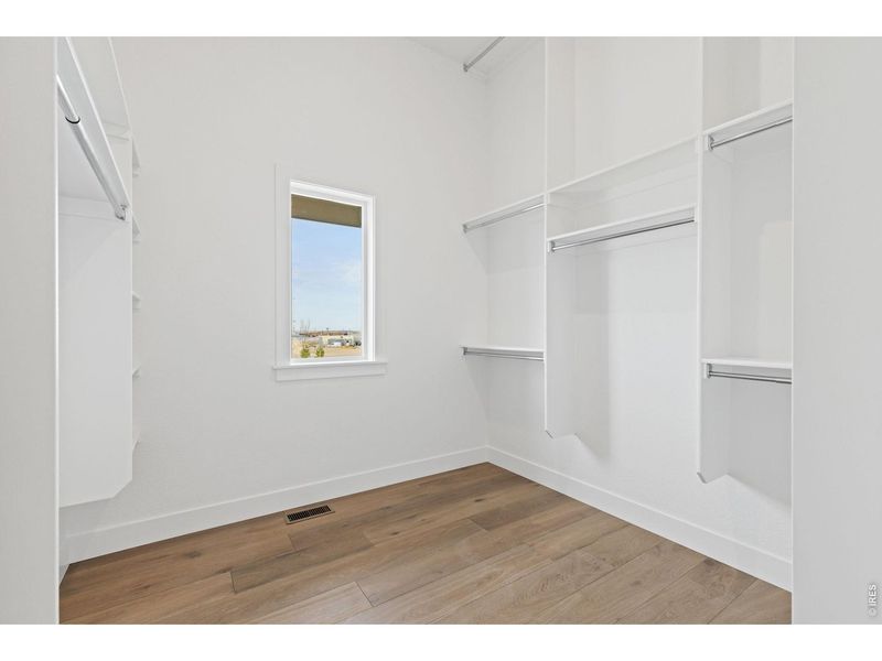 Spacious, unfurnished interior of a new home in RainDance, Windsor (Image 19).