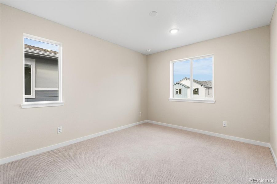 Spacious, unfurnished interior of a new home in Barefoot Village, Longmont (Image 16).