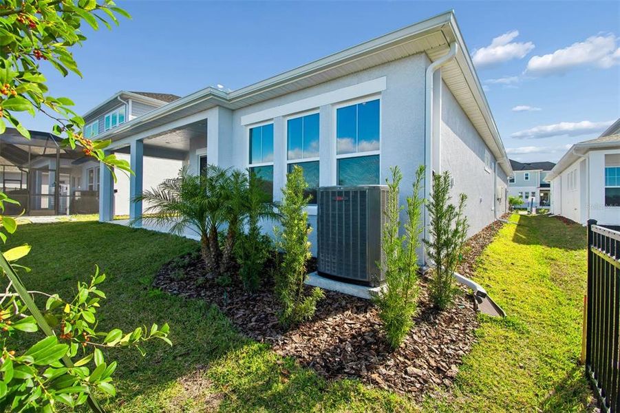 Exterior details and patio area of a home in Emerald Landing at Waterside at Lakewood Ranch – Lake Series, Sarasota (Image 26).