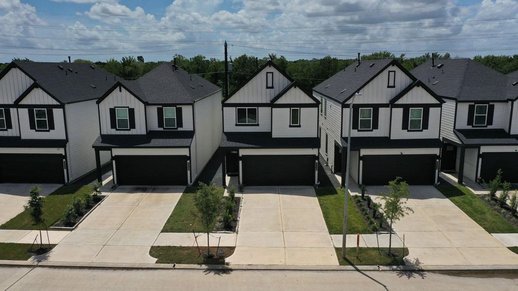 Front exterior of a new home in , Houston, TX, highlighting curb appeal (Image 22).