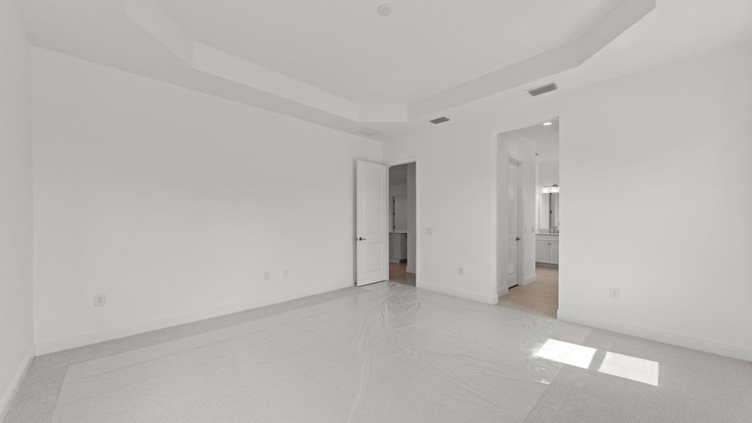 Spacious, unfurnished interior of a new home in Verandah Real Estate and Homes for Sale in Fort Myers, FL - Neal Communities, Fort Myers (Image 30).