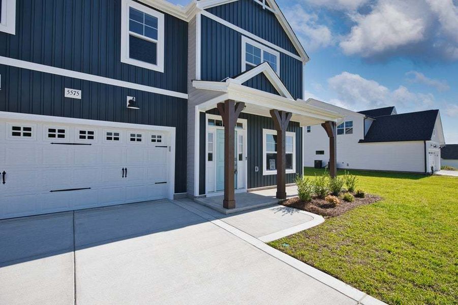 Representative exterior photo of a completed home built from the Magnolia by Caviness & Cates Communities in Bartlett Manor, Youngsville, NC (Image 18).