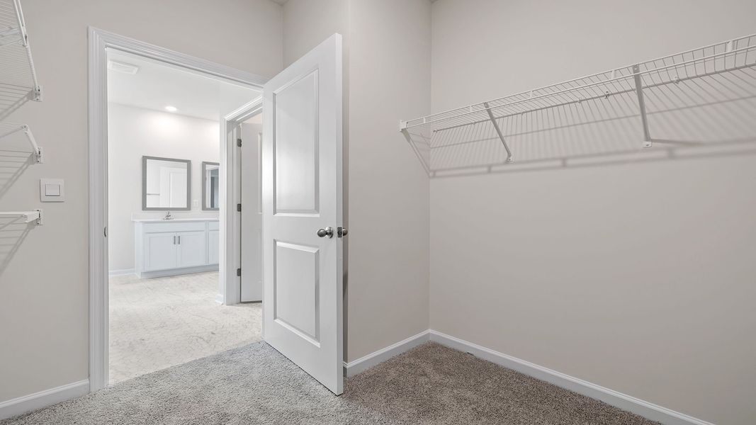 Spacious, unfurnished interior of a new home in Durbin Meadows Traditions, Fountain Inn (Image 32).