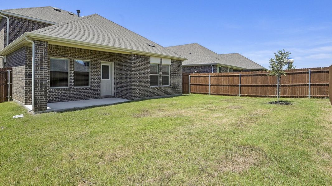 Exterior details and patio area of a home in Silverado, Aubrey (Image 3).