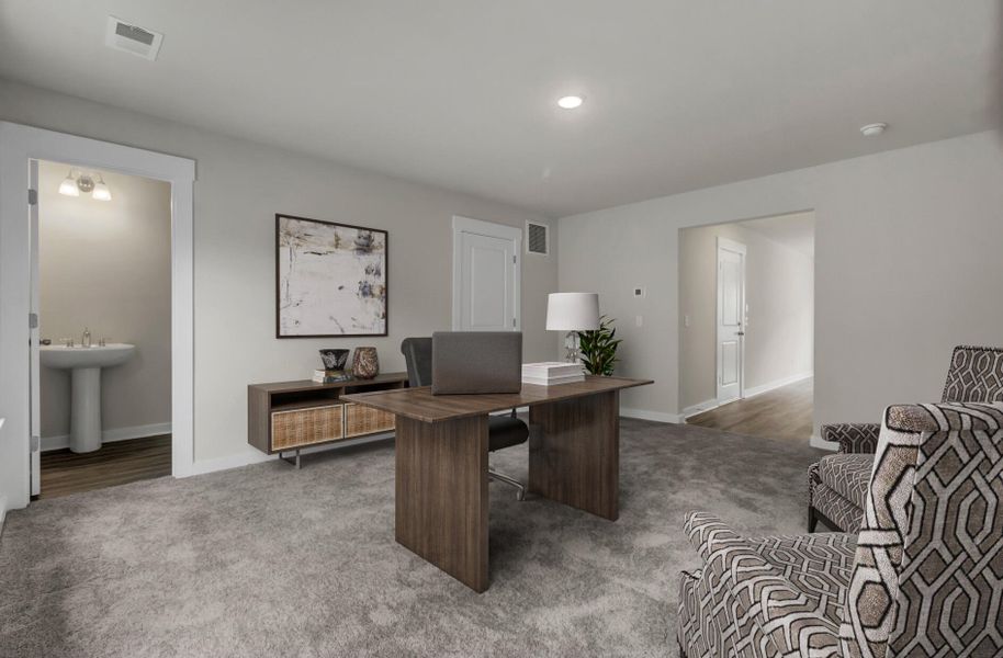 Furnished interior view inside a new home in Westpark at Cane Bay, Summerville (Image 17).