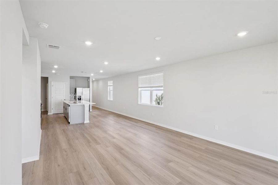 Spacious, unfurnished interior of a new home in Crescent Lakes - Premier Series, Punta Gorda (Image 13).