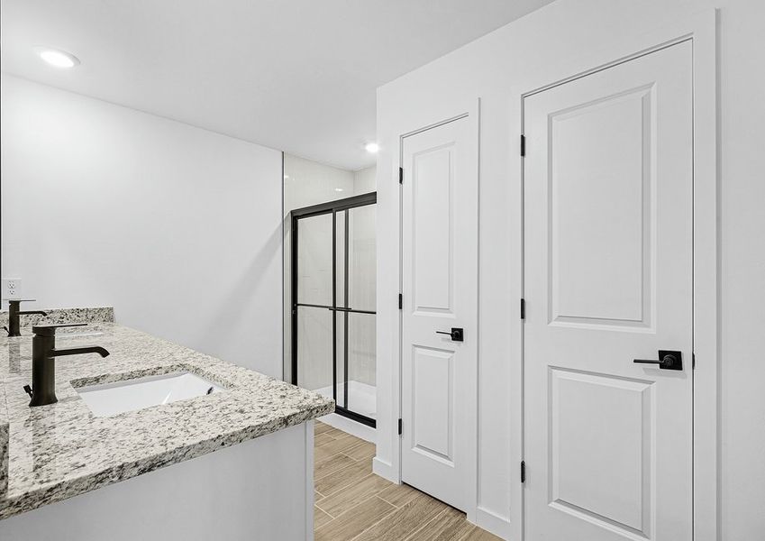 Get ready for your day in master bathroom