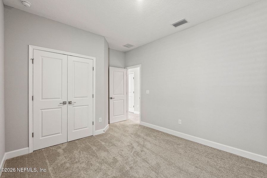 Spacious, unfurnished interior of a new home in Granville at eTown 38', Jacksonville (Image 40).