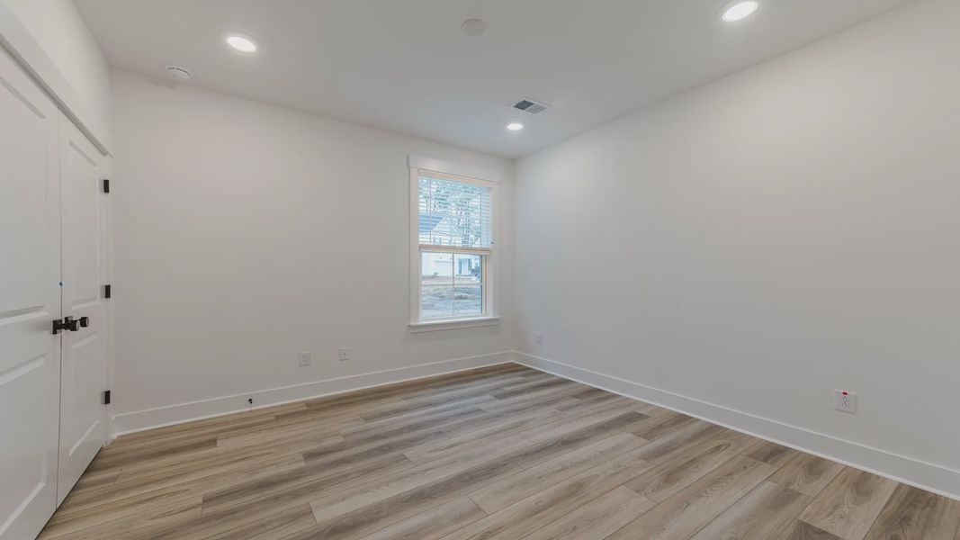 Furnished interior view inside a new home in Creekside at Andrews, Summerville (Image 5).