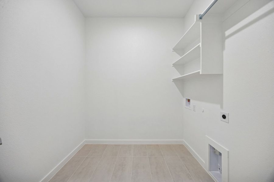 Utility Room in the Gilmour II home plan by Trophy Signature Homes – REPRESENTATIVE PHOTO