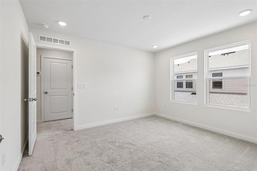 Spacious, unfurnished interior of a new home in Cyrene at Harmony, St. Cloud (Image 19). Spacious, unfurnished interior of a new home in Cyrene at Harmony, St. Cloud (Image 19).