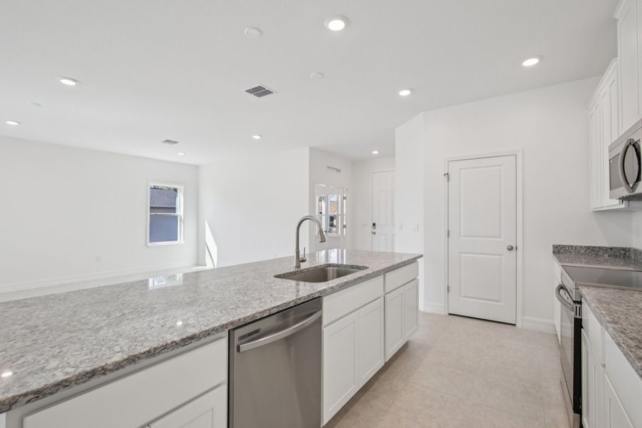 Representative furnished interior of a home built from the Melody by Maronda Homes in Port St. John, Cocoa (Image 6).