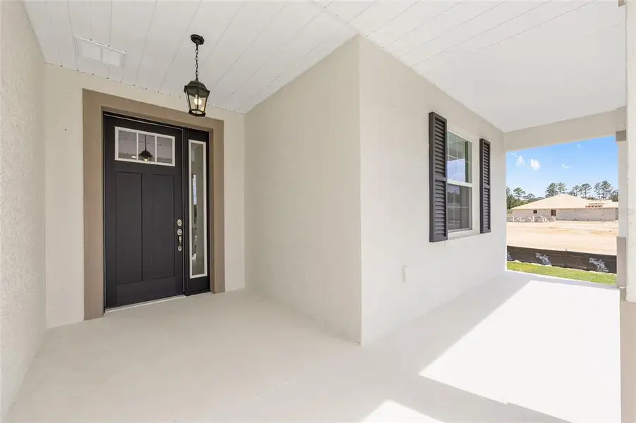 Exterior details and patio area of a home in , Ocala (Image 21). Exterior details and patio area of a home in , Ocala (Image 21).
