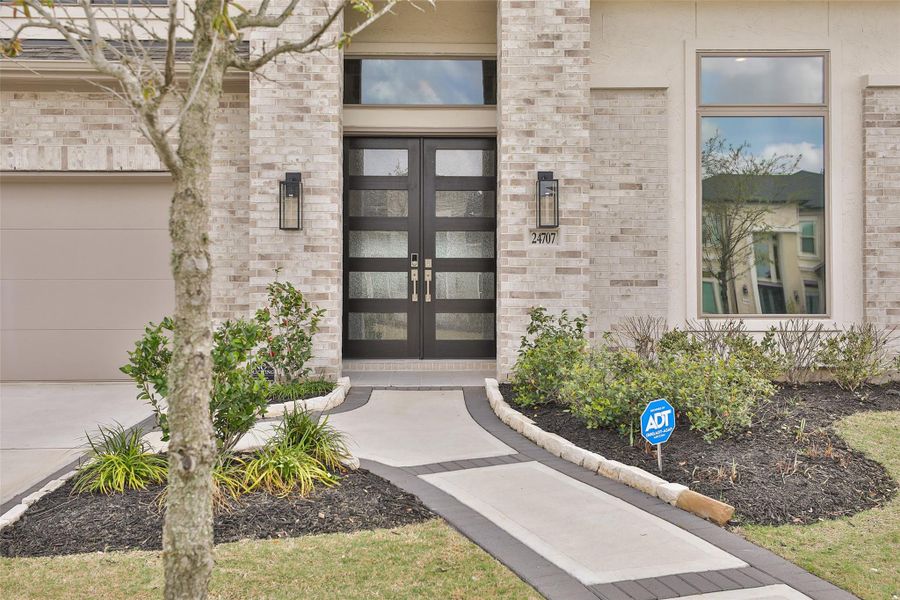Exterior details and patio area of a home in Elyson, Katy (Image 25).