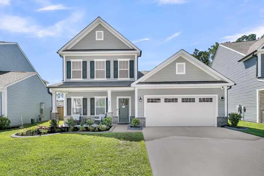 Front exterior of a new home in , Summerville, SC, highlighting curb appeal (Image 1). Front exterior of a new home in , Summerville, SC, highlighting curb appeal (Image 1).